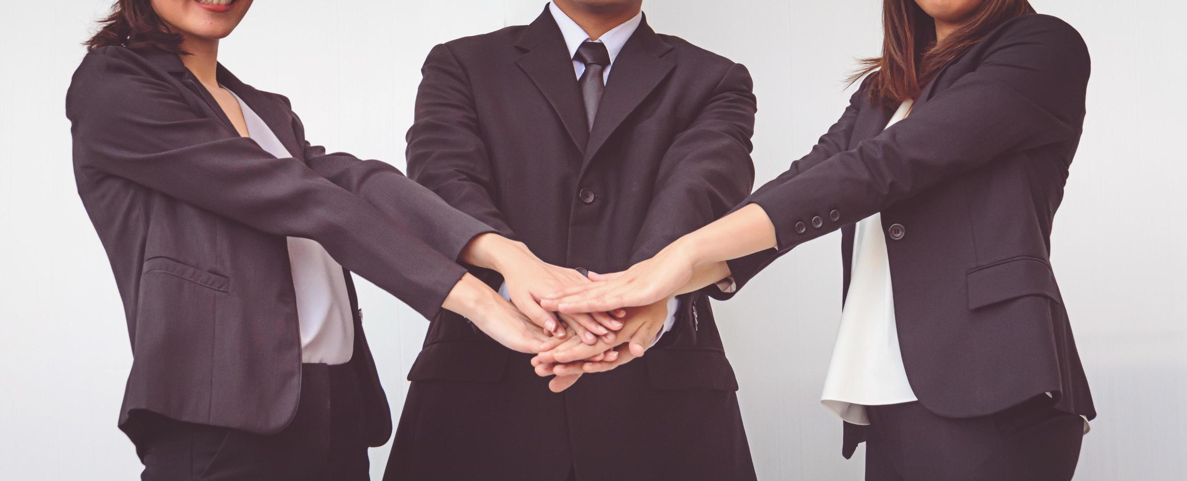 business people coordinate hands. Concept Teamwork photo