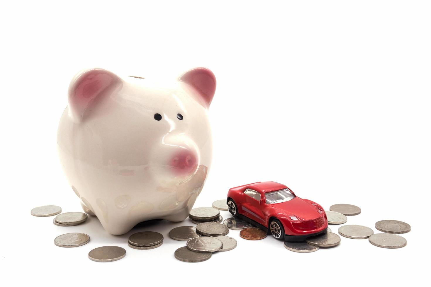 piggy bank with car and coin on white background photo