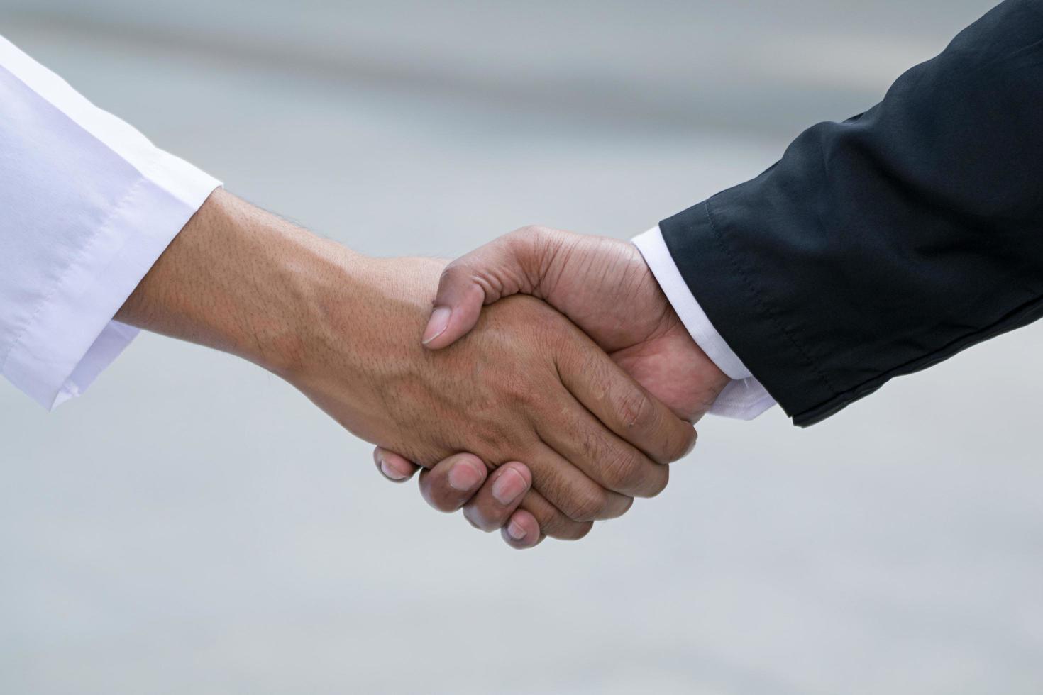 Arab businessmen worker handshaking on construction site photo