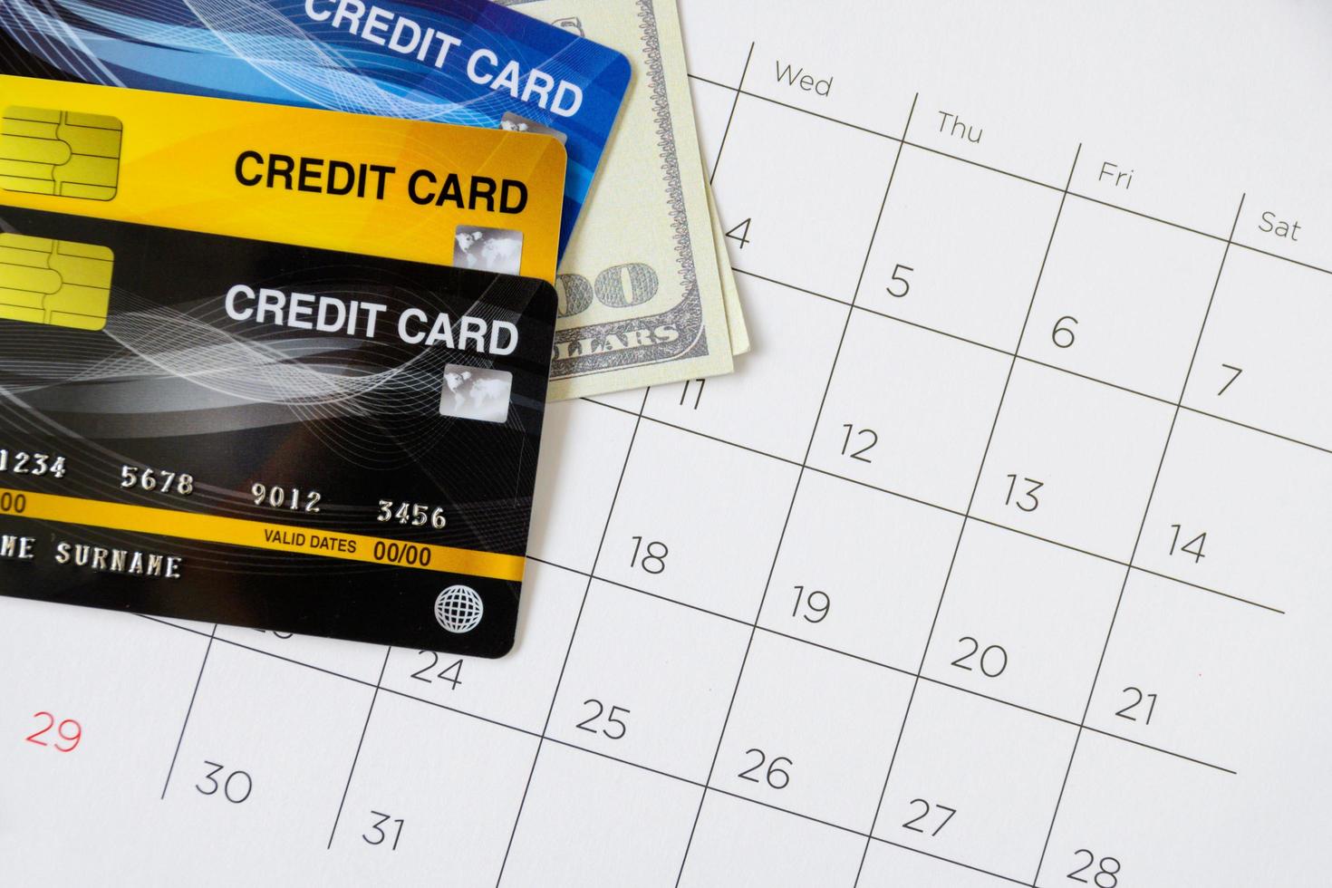 Calendar with days and Credit card on table. shopping concept 7183950
