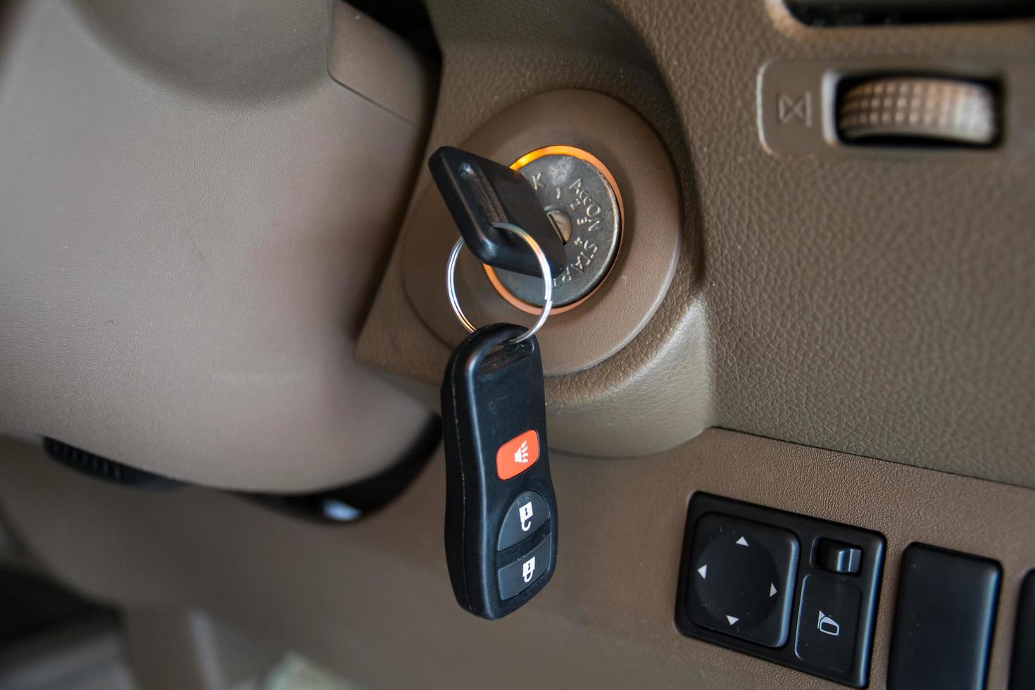 car key in ignition start lock photo