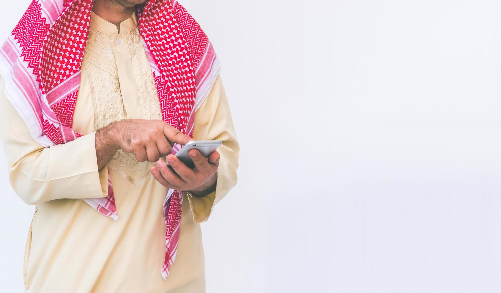 Arab businessman useing on a mobile phone photo