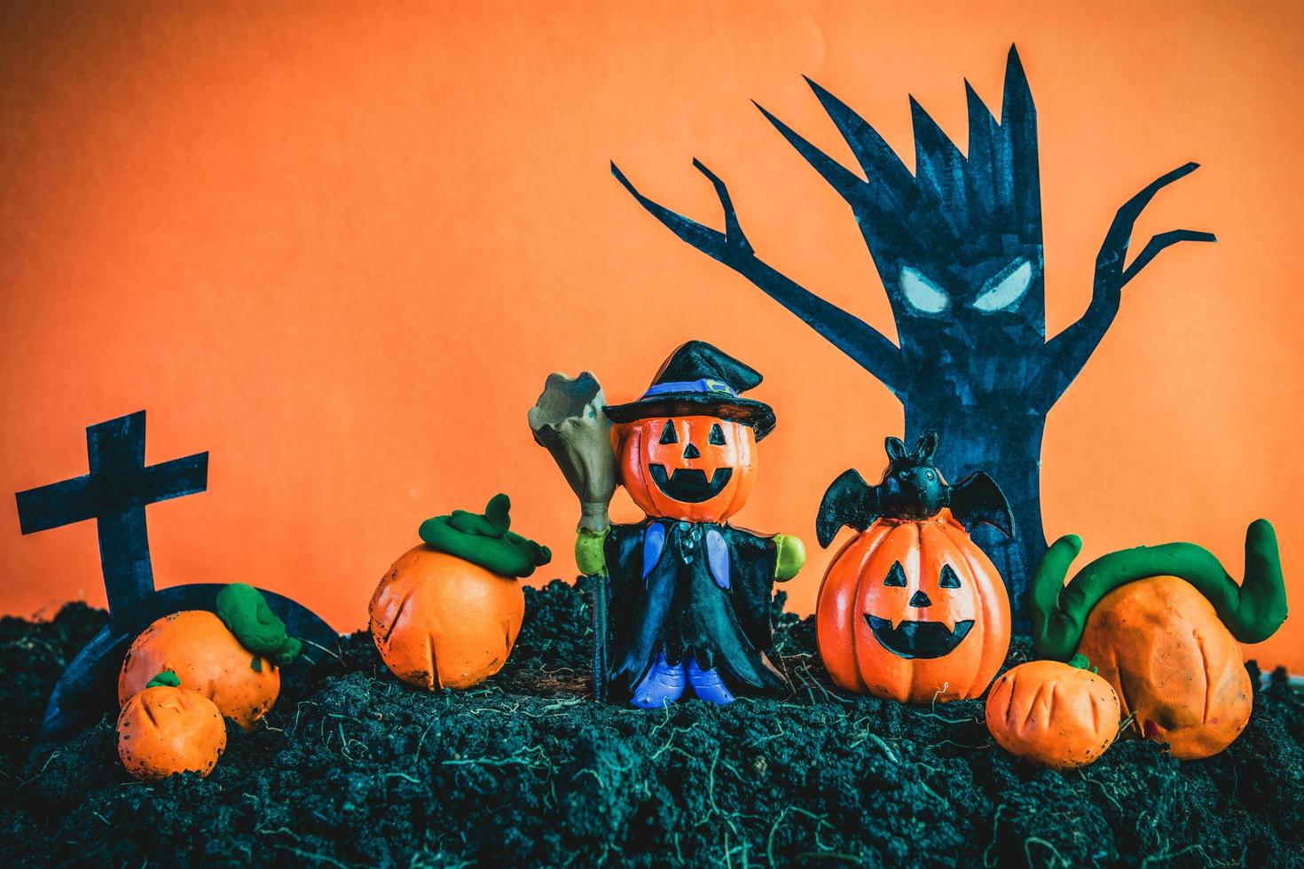 Halloween Pumpkins on soil photo