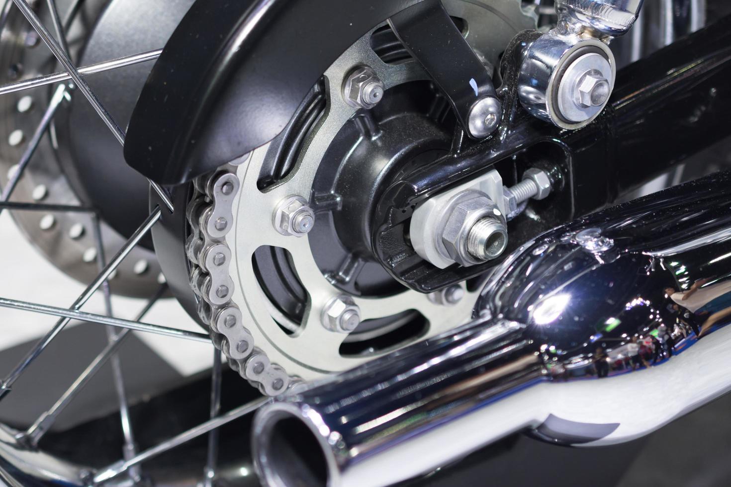 rear chain and sprocket of motorcycle wheel photo