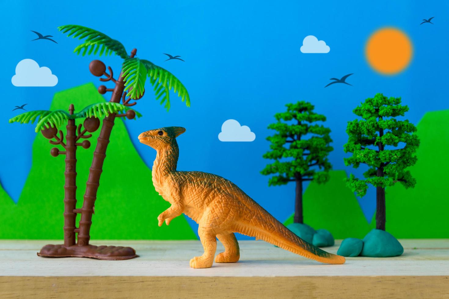 Parasaurolophus dinosaur toy model on wild models background photo