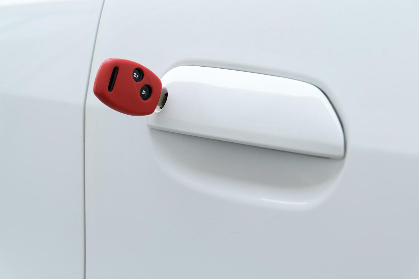 open car door with red key photo