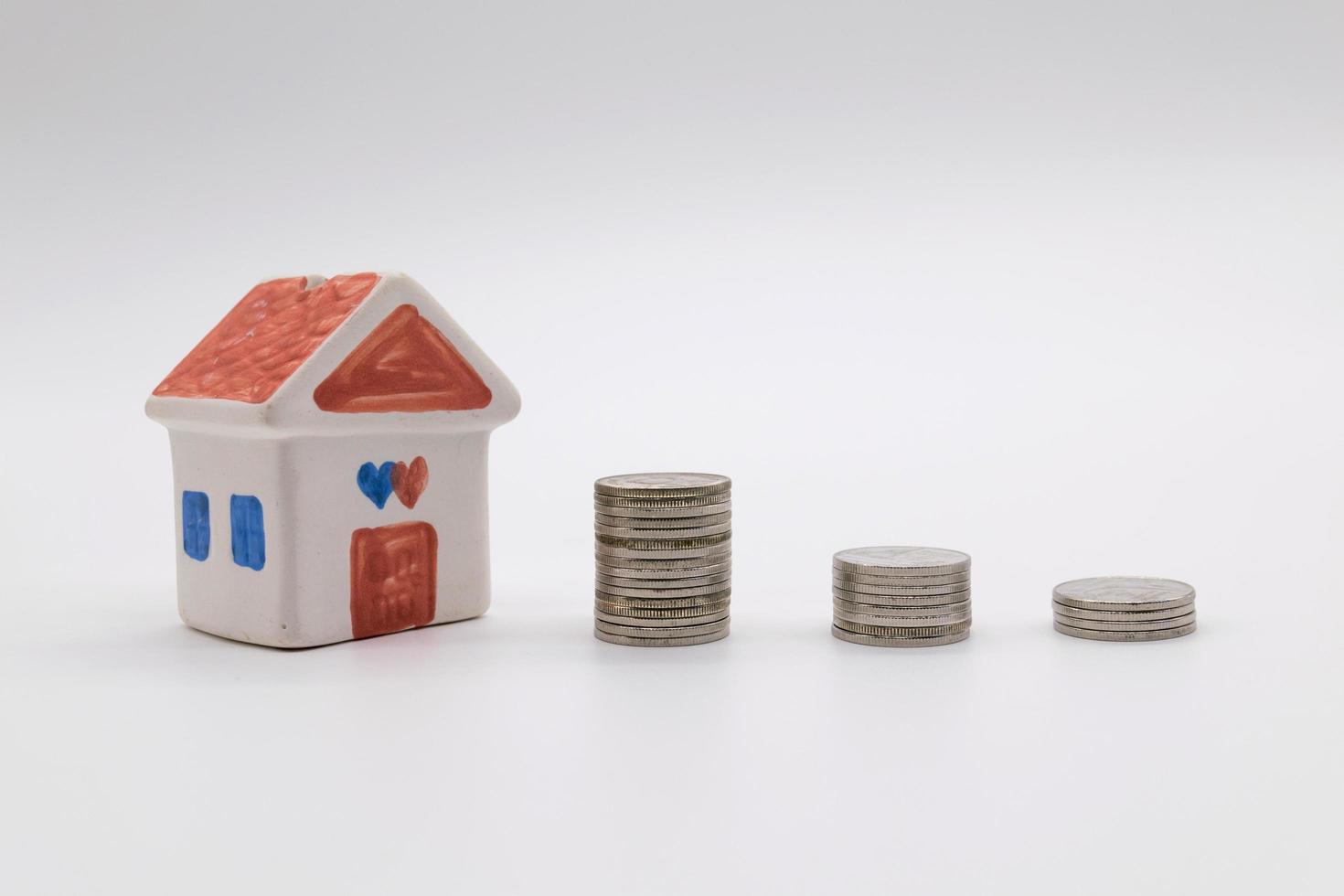 Savings plans for housing on white background photo