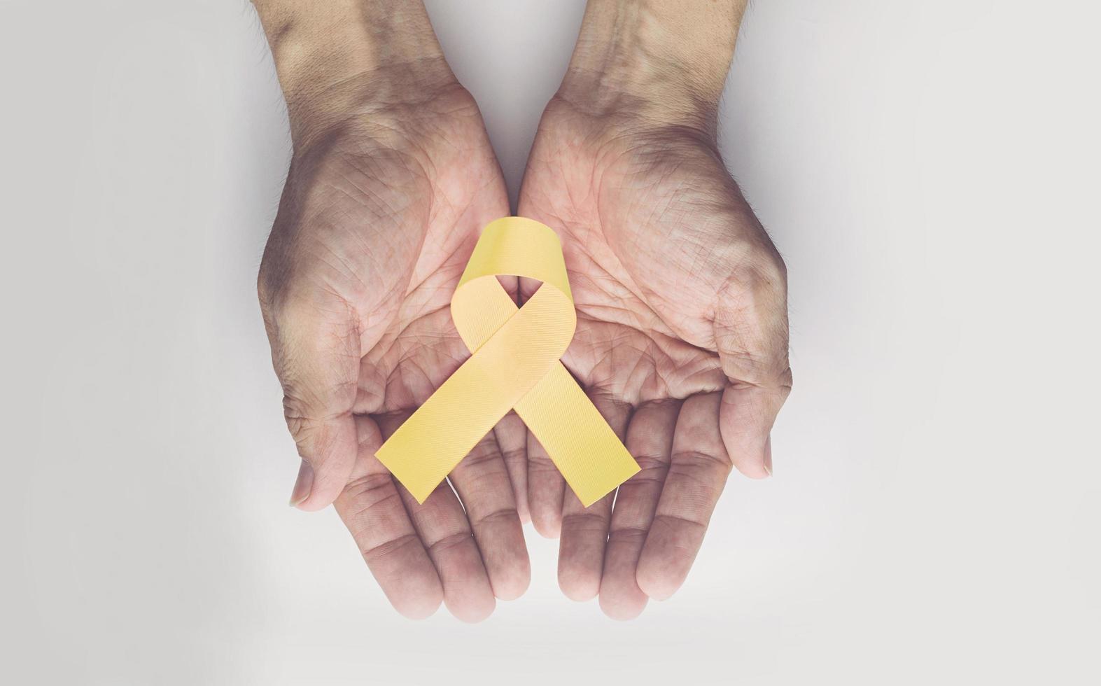 Childhood cancer awareness gold ribbon photo