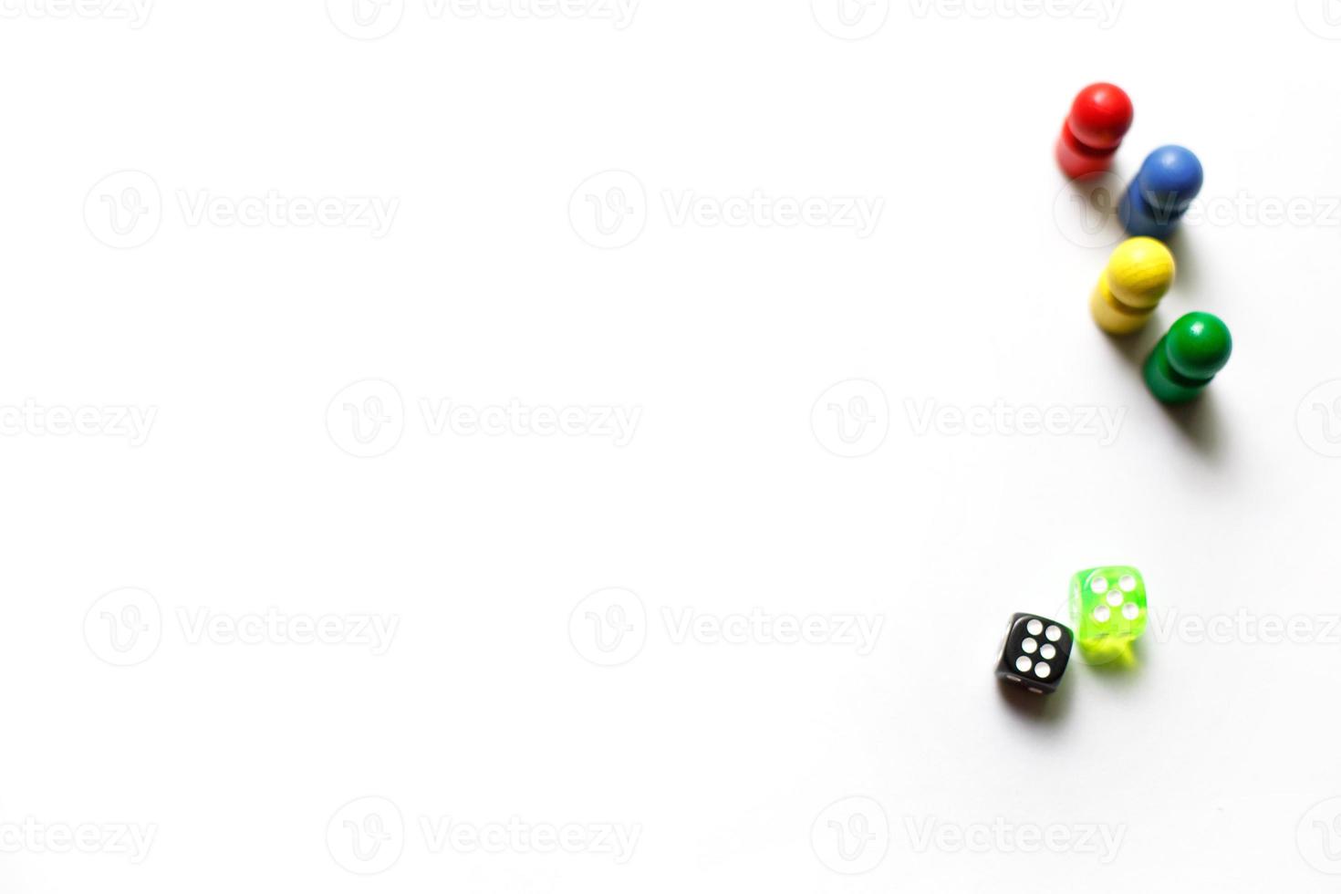 Game cubes, chips, hourglass on a white background. T photo