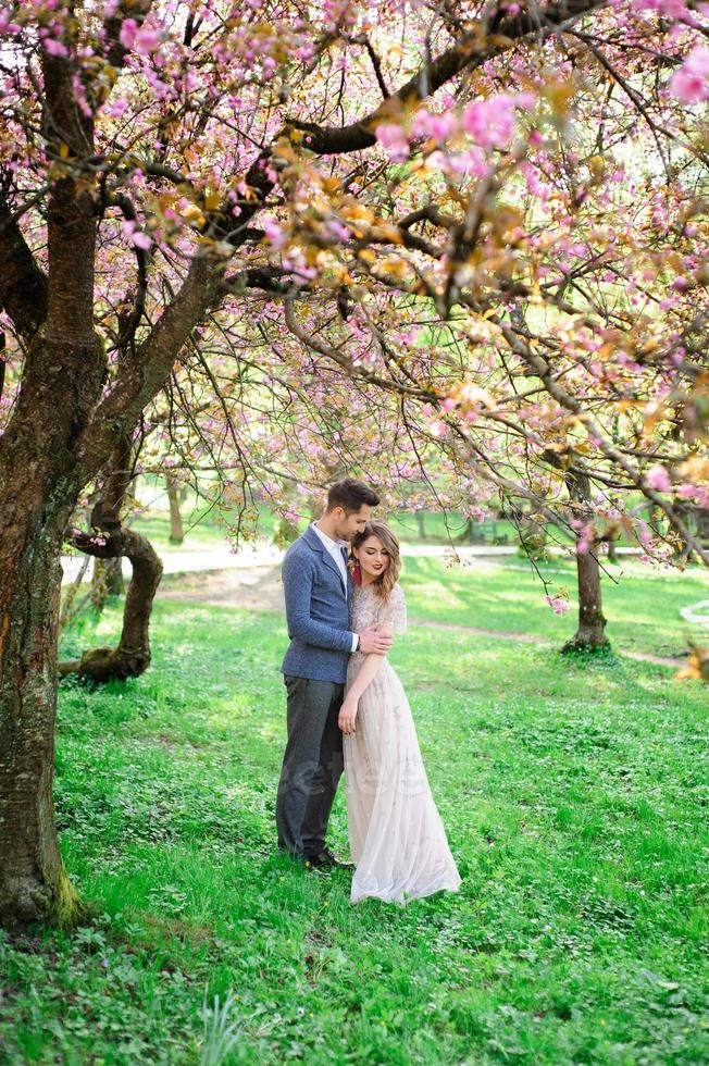 Bride and groom on a walk photo