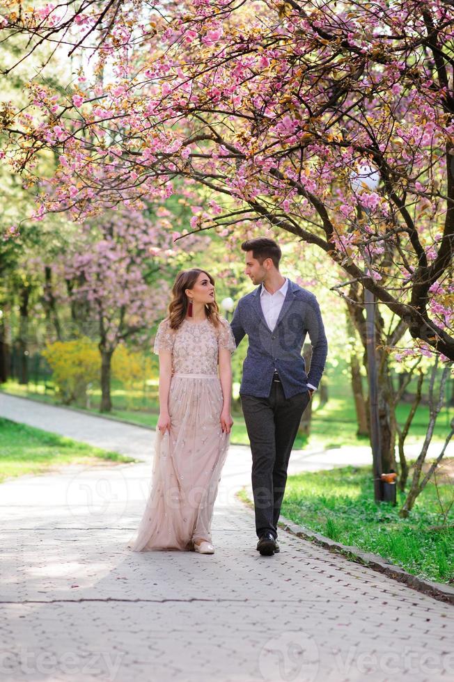 Bride and groom on a walk photo