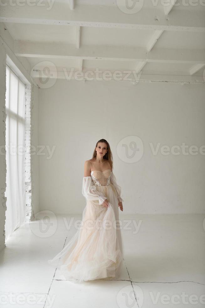 Portrait of a beautiful bride close-up on a white background. photo