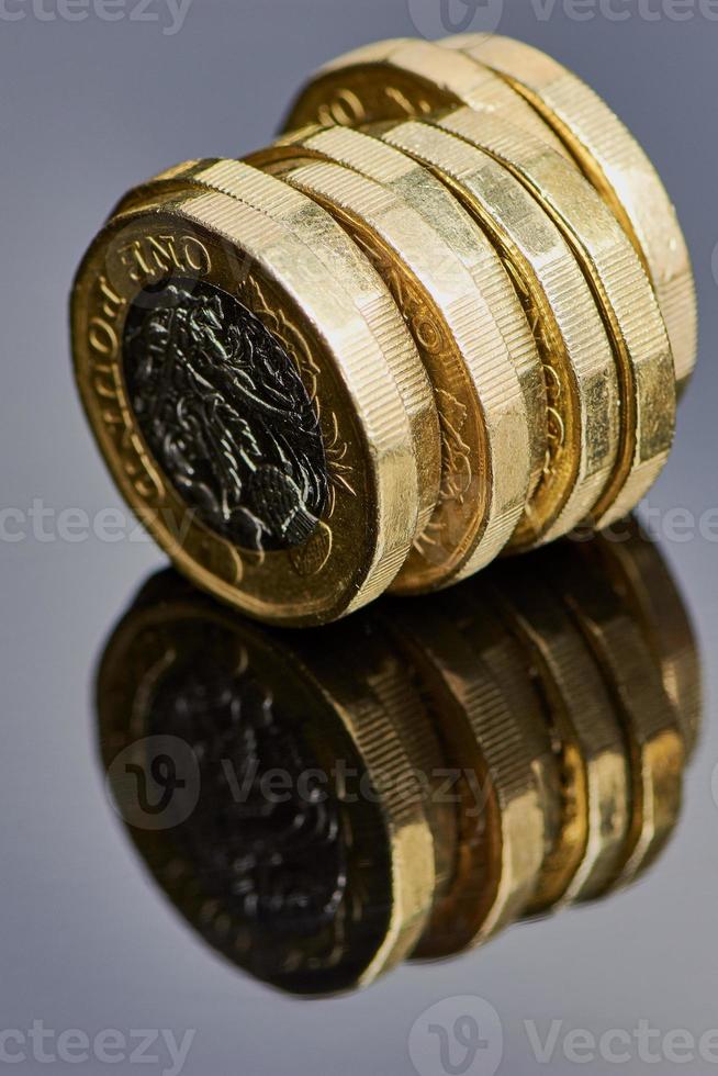 British pound lying on a gray background photo