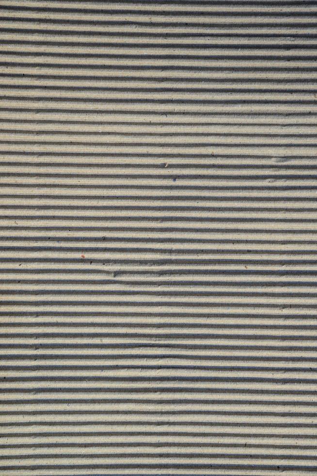 Corrugated cardboard sheet texture useful as a background photo