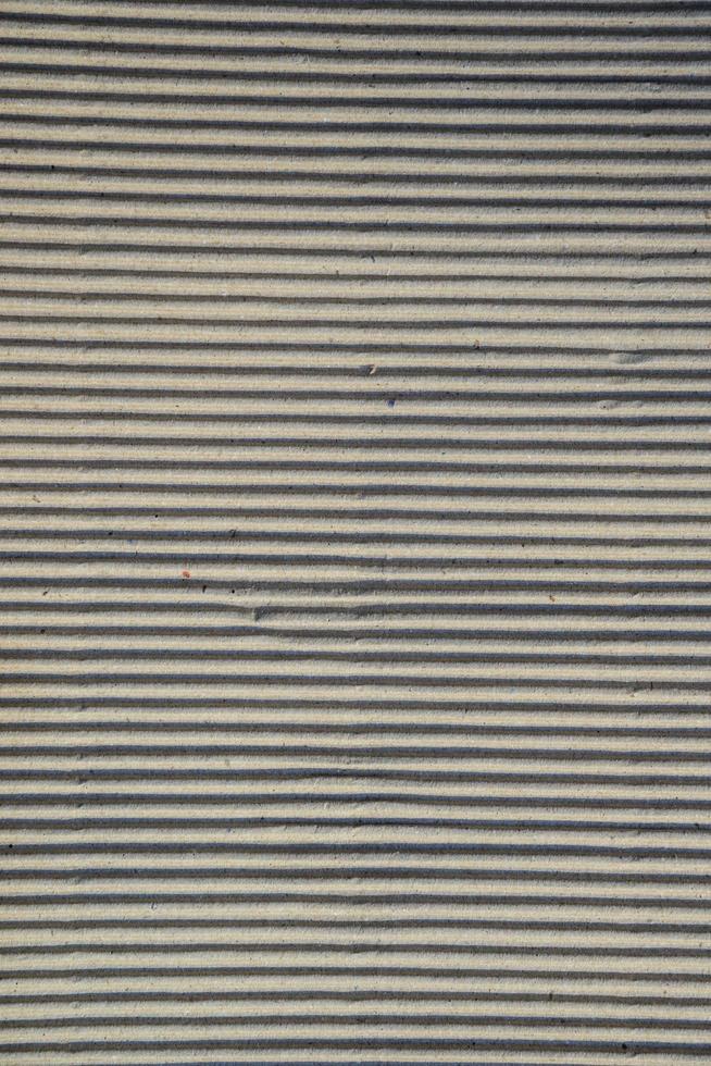 Corrugated cardboard sheet texture useful as a background photo