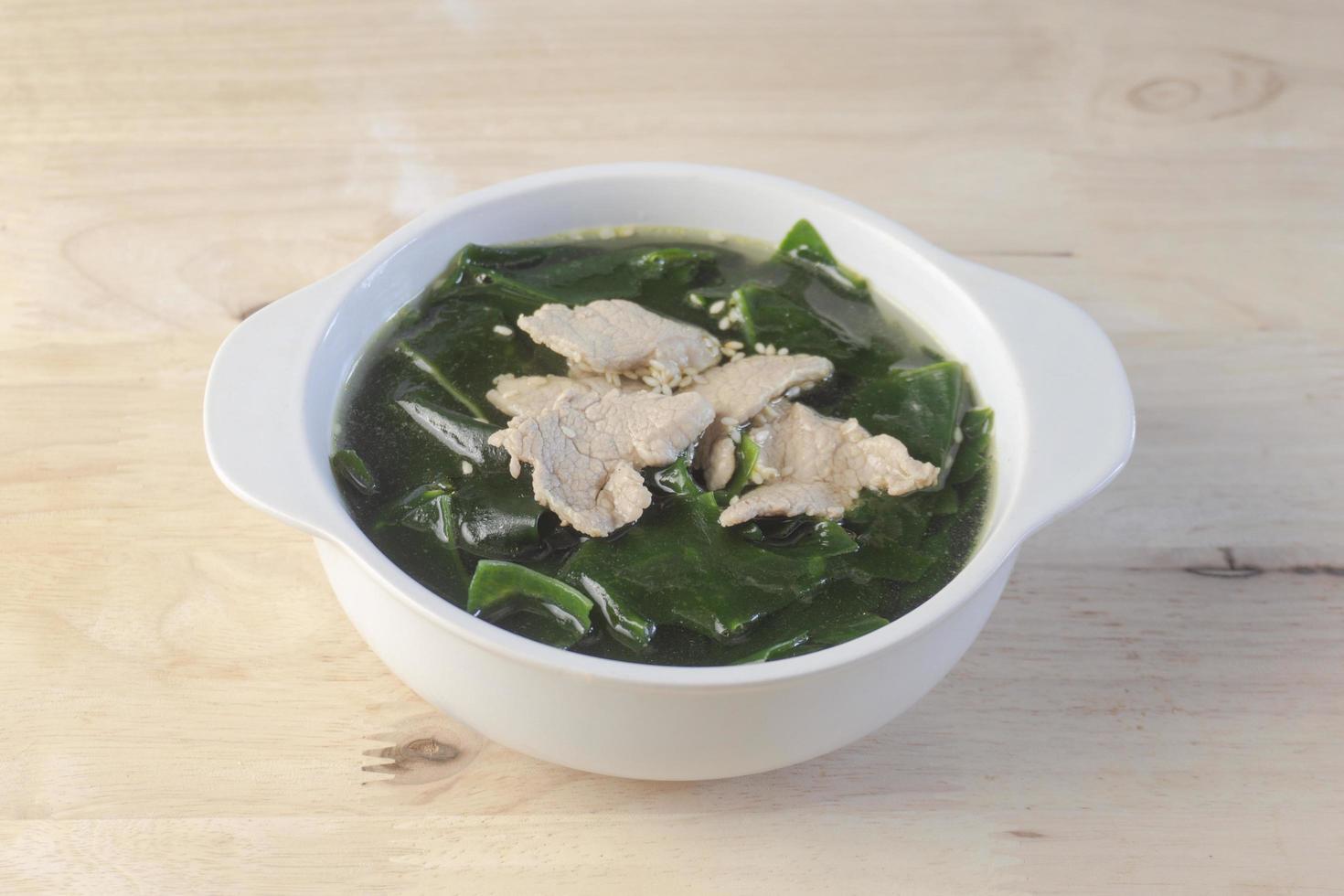 Close-up Miyeok Guk or Korean seaweed soup is traditionally eaten on a birthday. photo