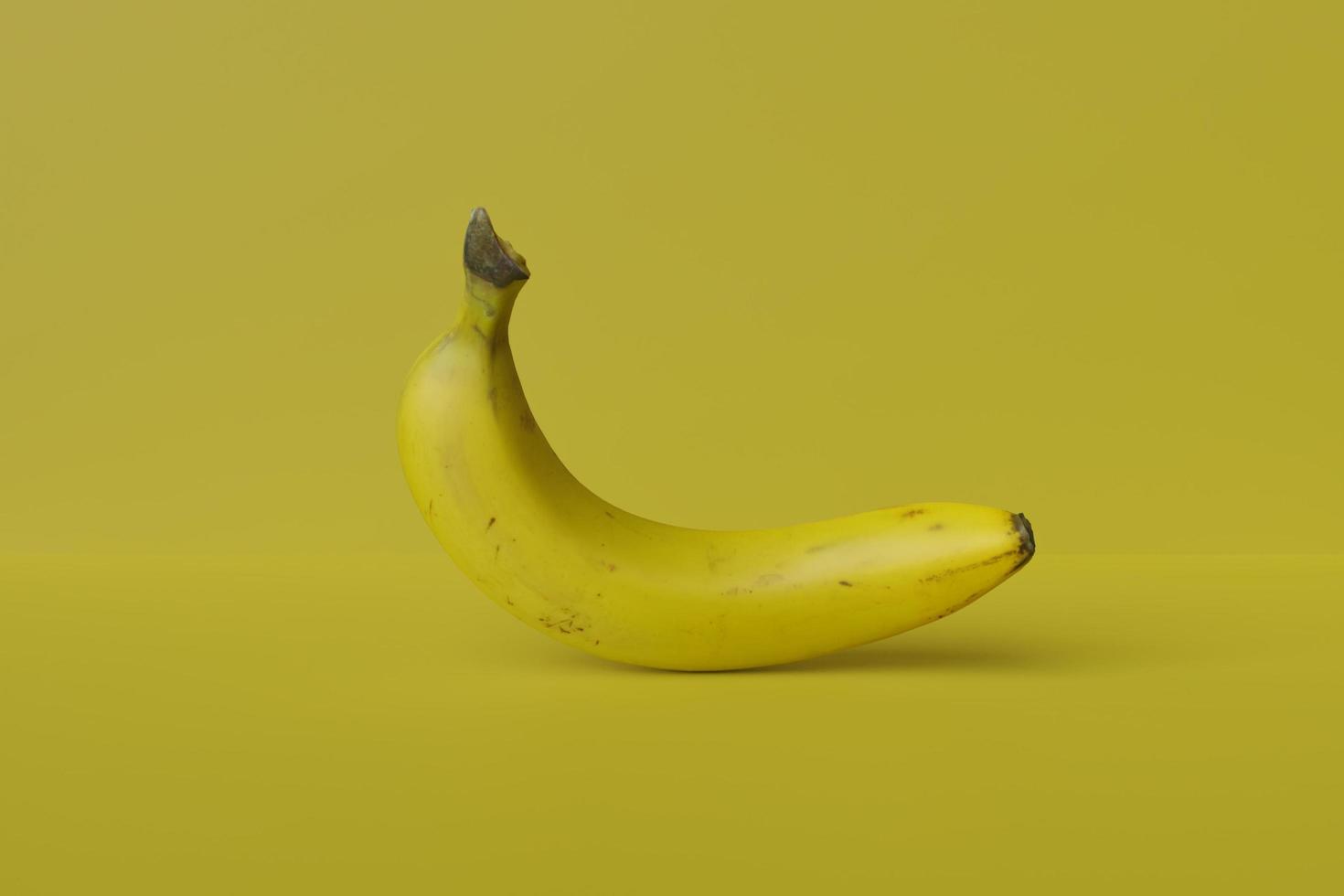 Banana with isolated on yellow background photo