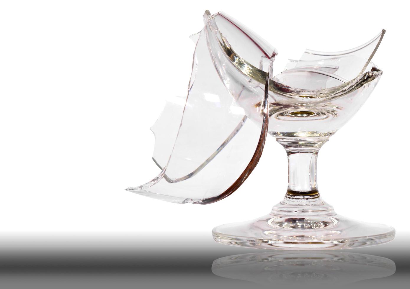 Broken wine glass is damaged. photo