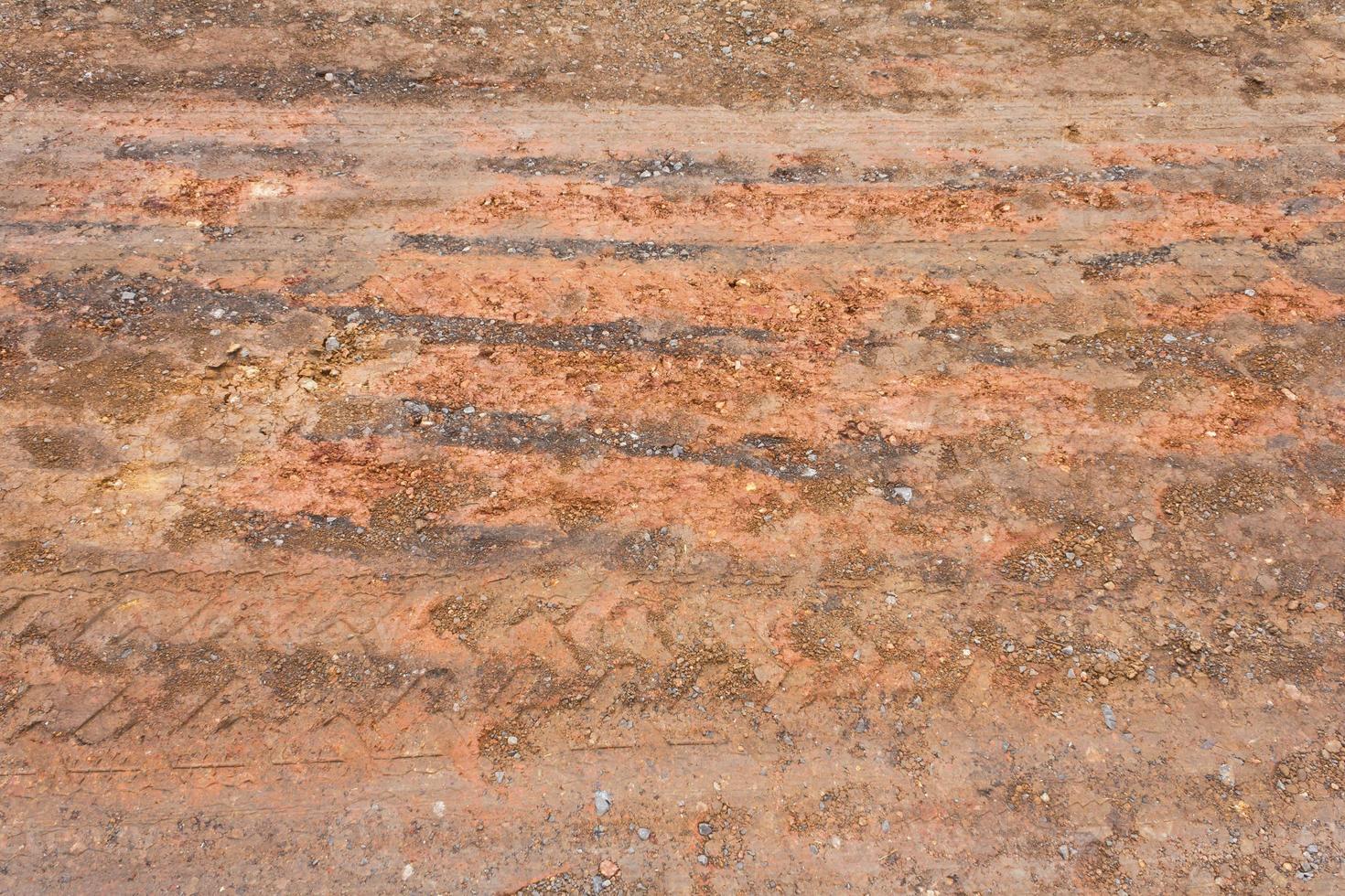 Surface of the ground at the road wheels and tracks. photo