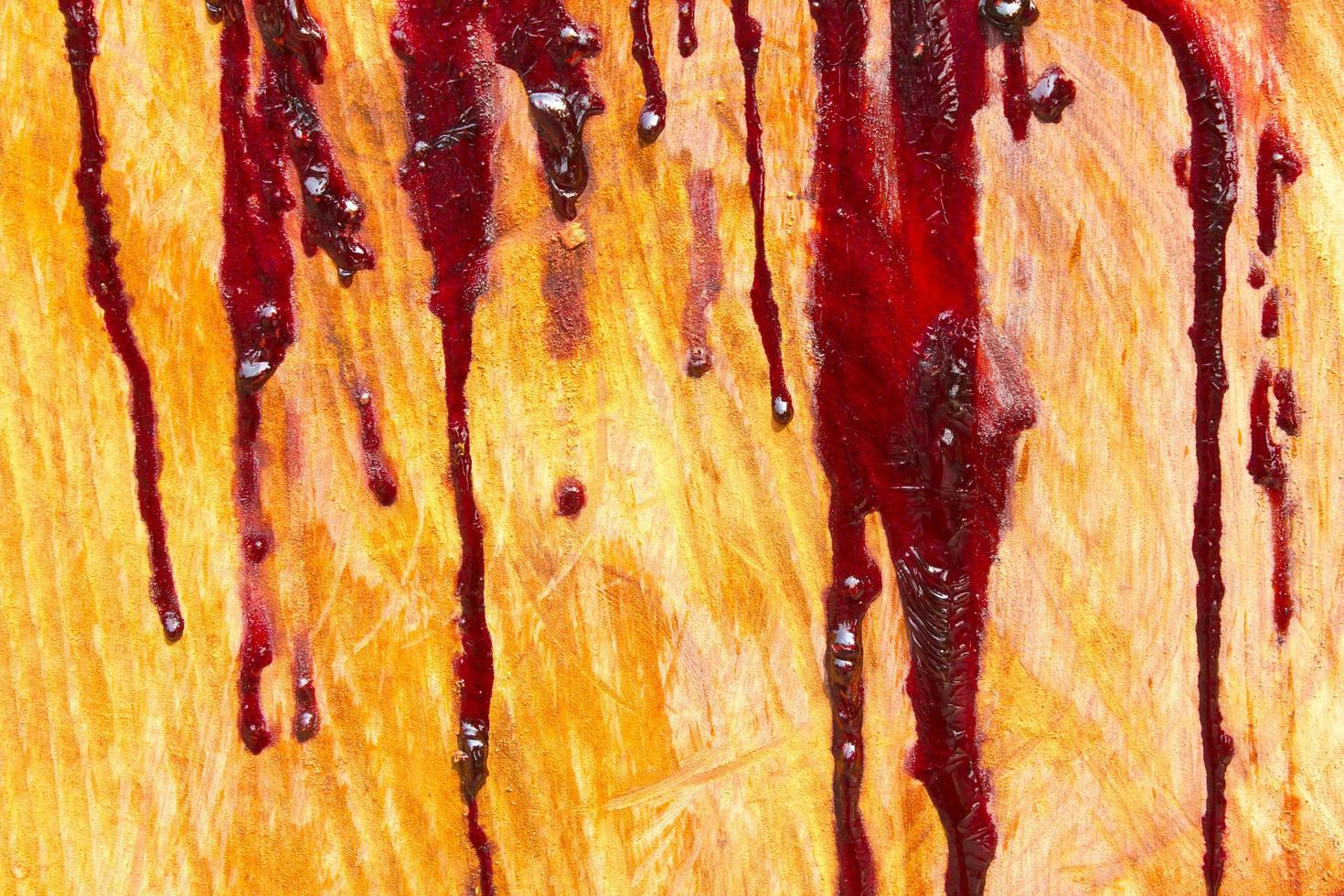 Rubber trees have turned red on a hardwood surface. photo
