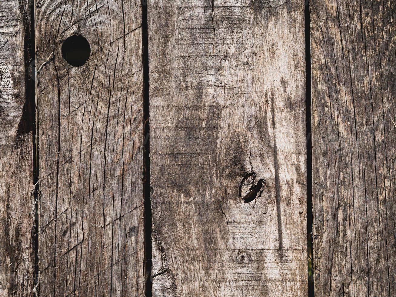 The abstract wooden background texture of old weathered pine boards photo