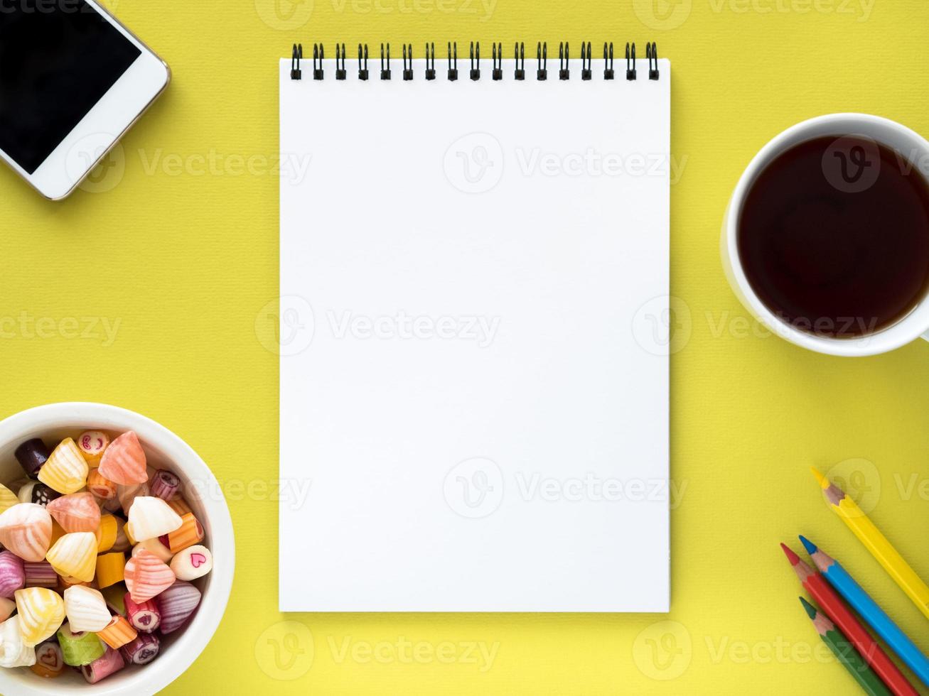 Open notepad on spiral with clean white page photo
