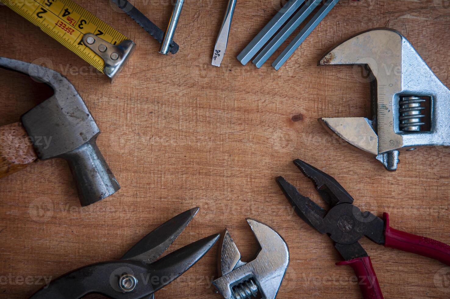 Top view of working tools on wooden desk. Copy space concept. photo