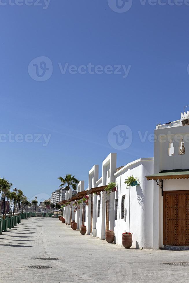 Arabic architecture in the old medina. Streets, doors, windows, details photo