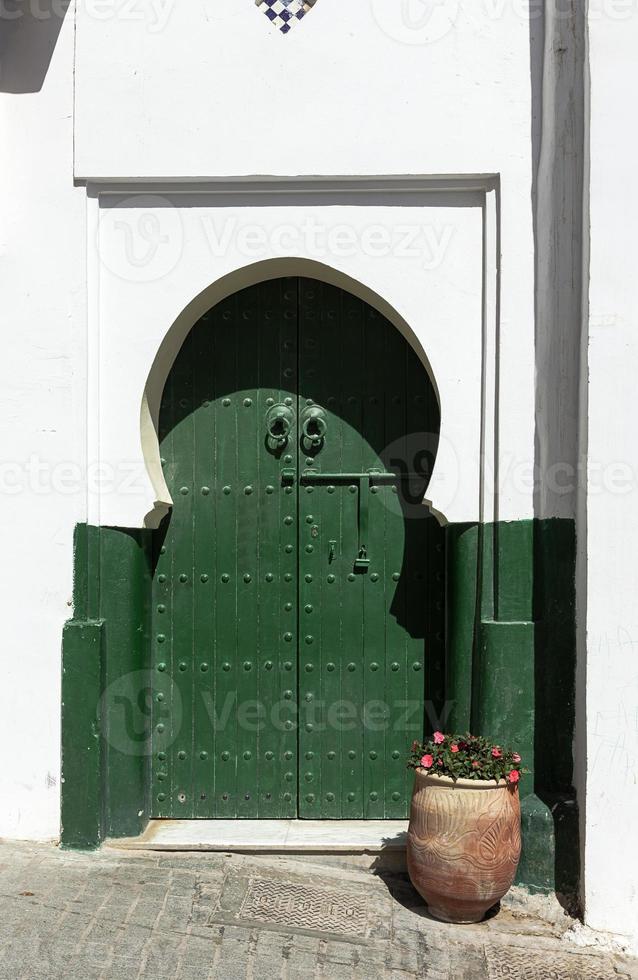 Arabic architecture in the old medina. Streets, doors, windows, details photo