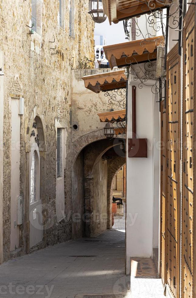 Arabic architecture in the old medina. Streets, doors, windows, details photo