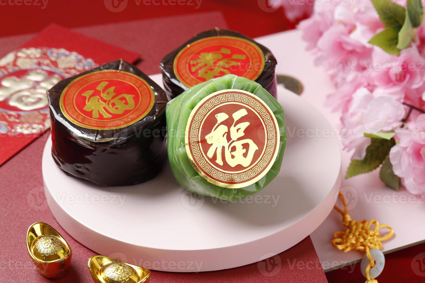 Nian Gao Pandan or Glutinous Rice Cake with Good Luck in Chinese Words. Popular as Kue Keranjang or Kue Bakul. photo