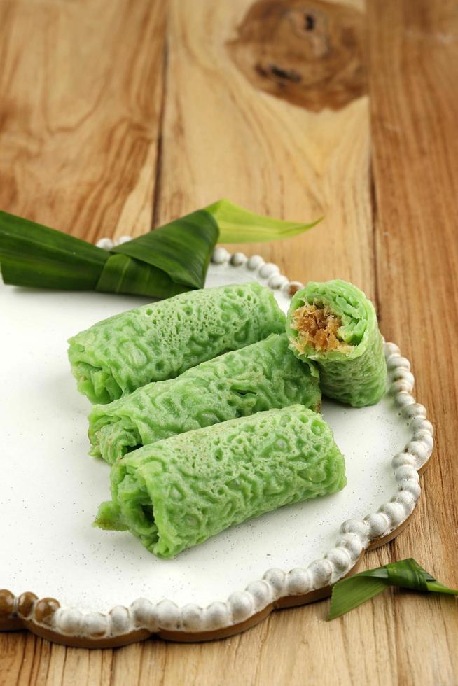 Dadar Gulung, Traditional Indonesian Malaysian Crepes Snack Made from Glutinous Rice photo