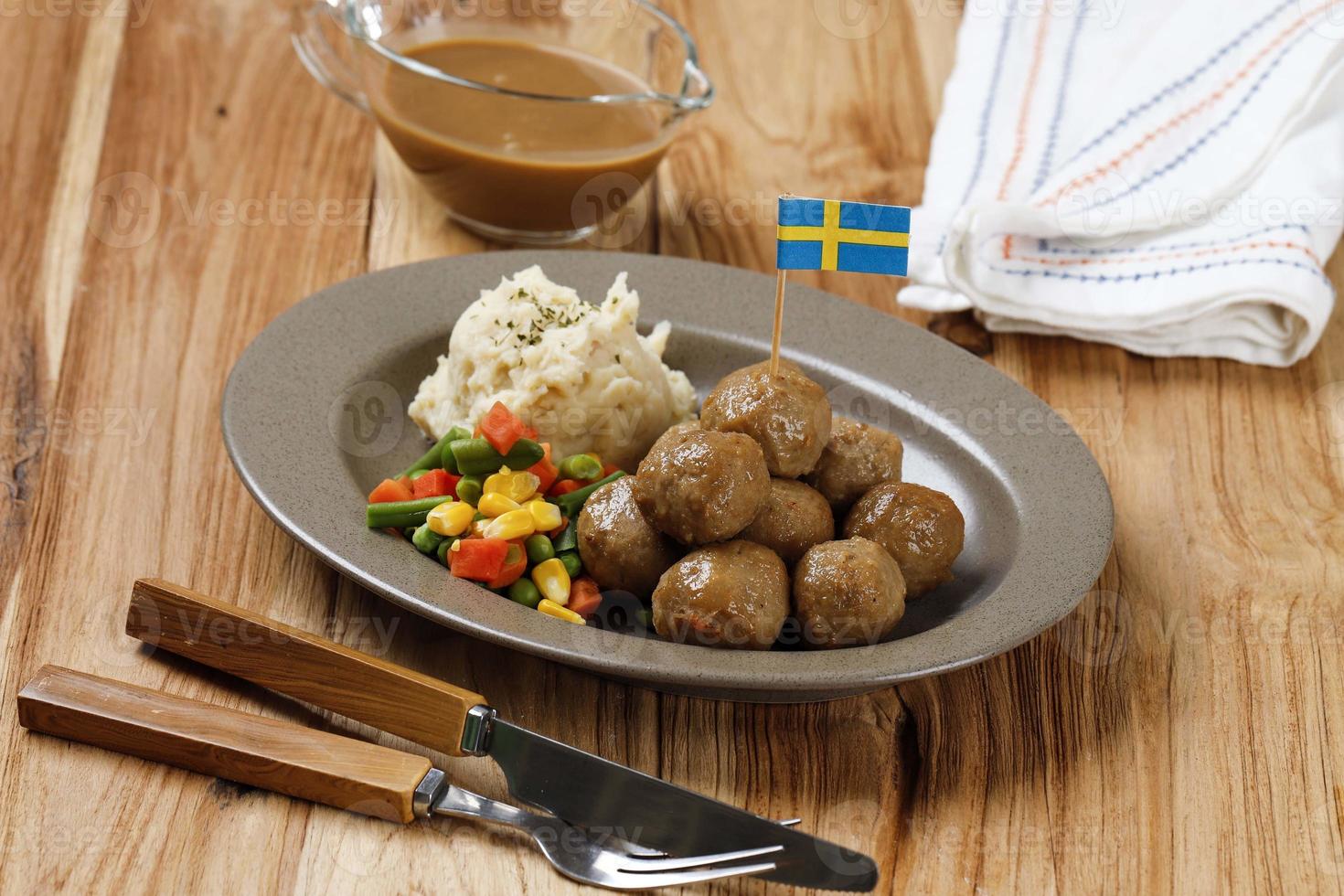 Swedish Meatball with Mushroom Brown Sauce and Boiled Vegetable, Served with Creamy Mashed Potato photo