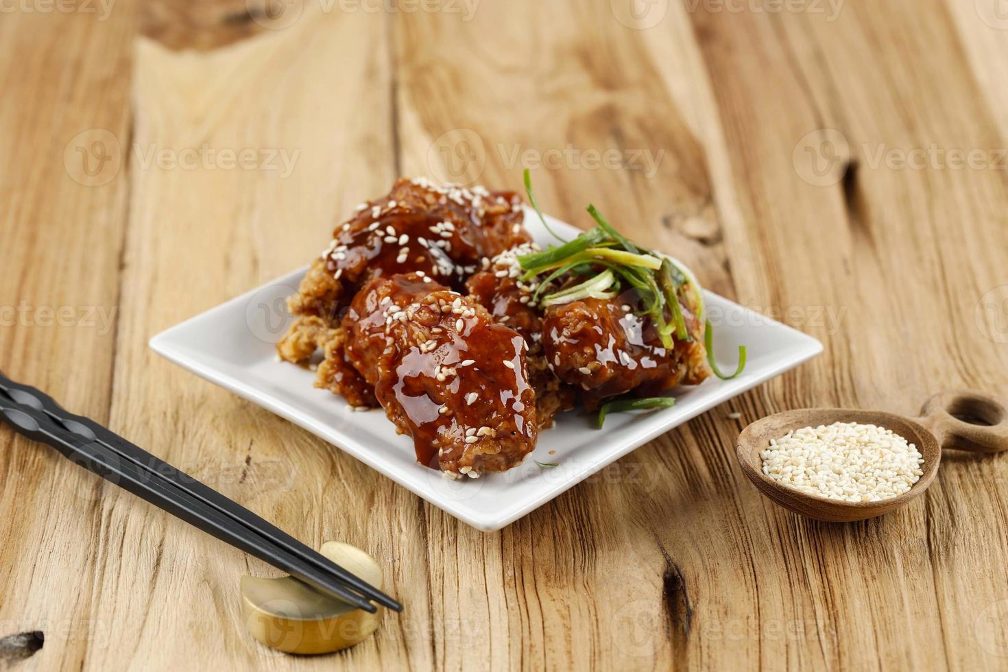 Deep Fried Crispy Chicken with Garlic Sauce in Korean Style or Dakgangjeong photo