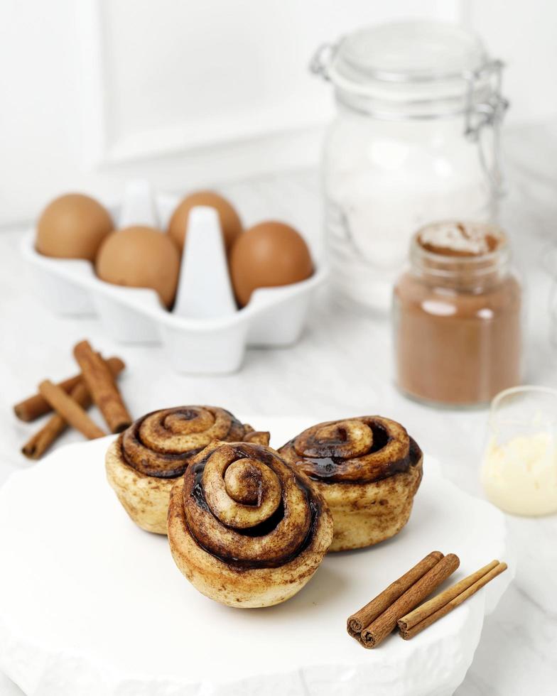 Homemade Cinnamon Roll Bread, Served on White Plate photo