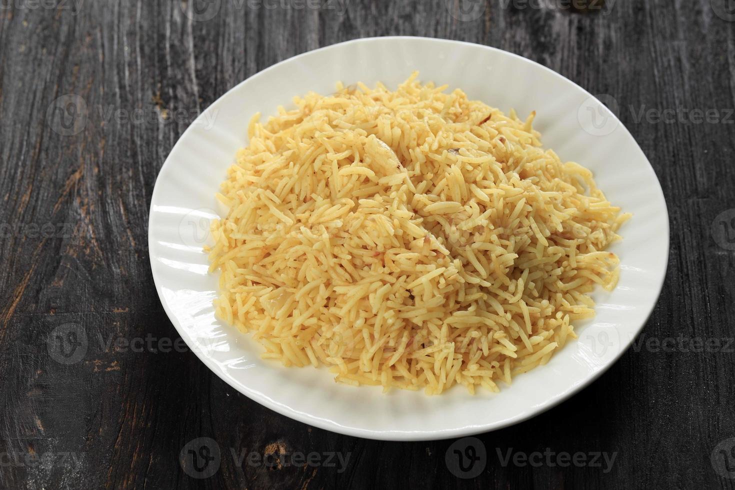 Plain Biryani on White Plate, Delicious Plain Kuska, Made with Basmati Rice photo