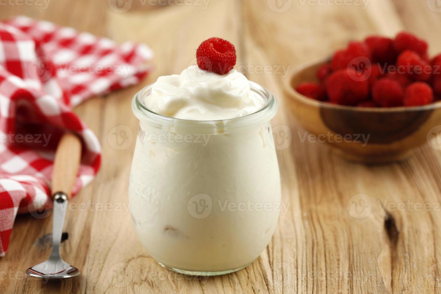 White Yoghurt eith Fresh Raspberry on a Jar photo