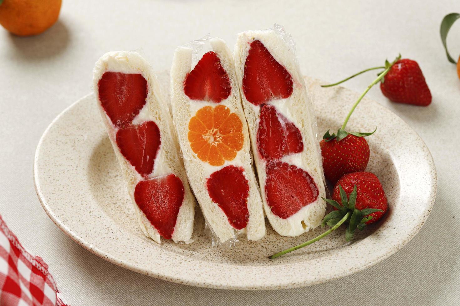 Japanese Style Sweet Fruits Sandwich with Strawberry and Orange. photo