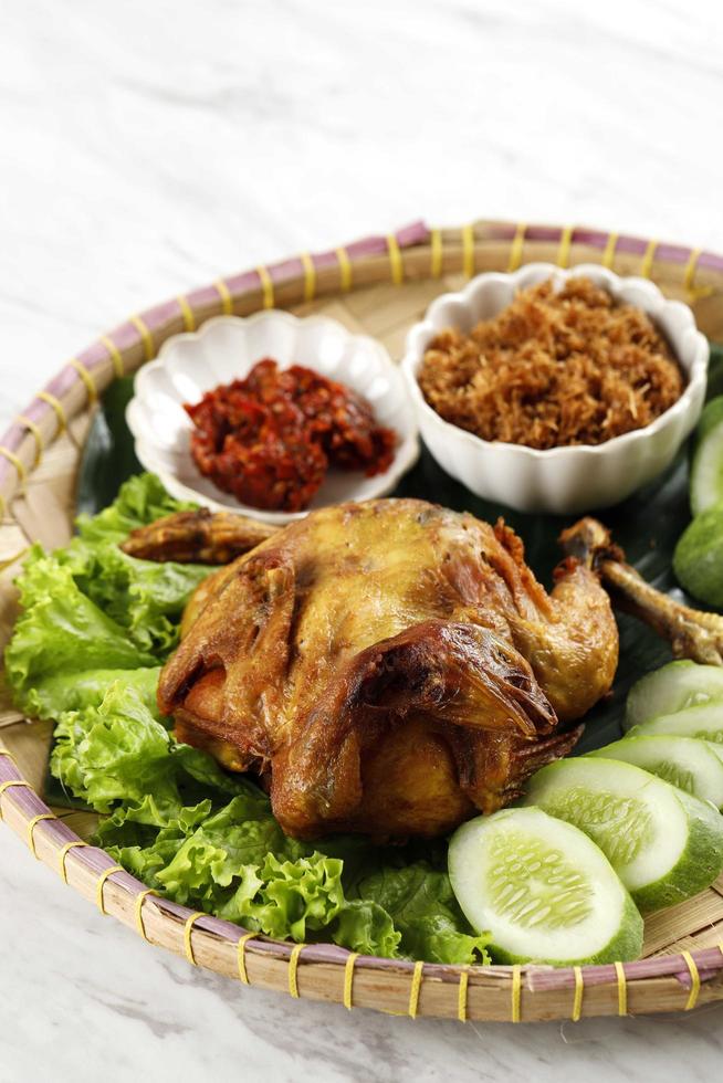 Ayam Ingkung Goreng or Bakakak Hayam, Deep Fried Whole Chicken photo