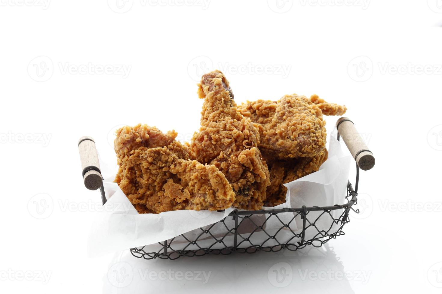 Homemade Crispy Fried Chicken on Wire Basket photo