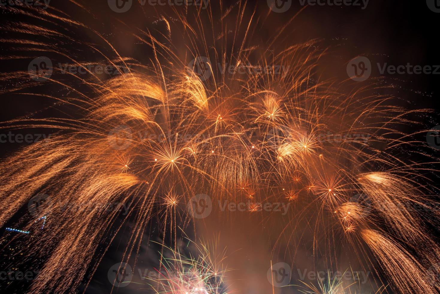 fireworks on the river in the dark sky photo