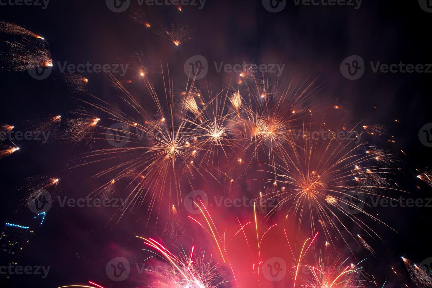 fireworks on the river in the dark sky photo