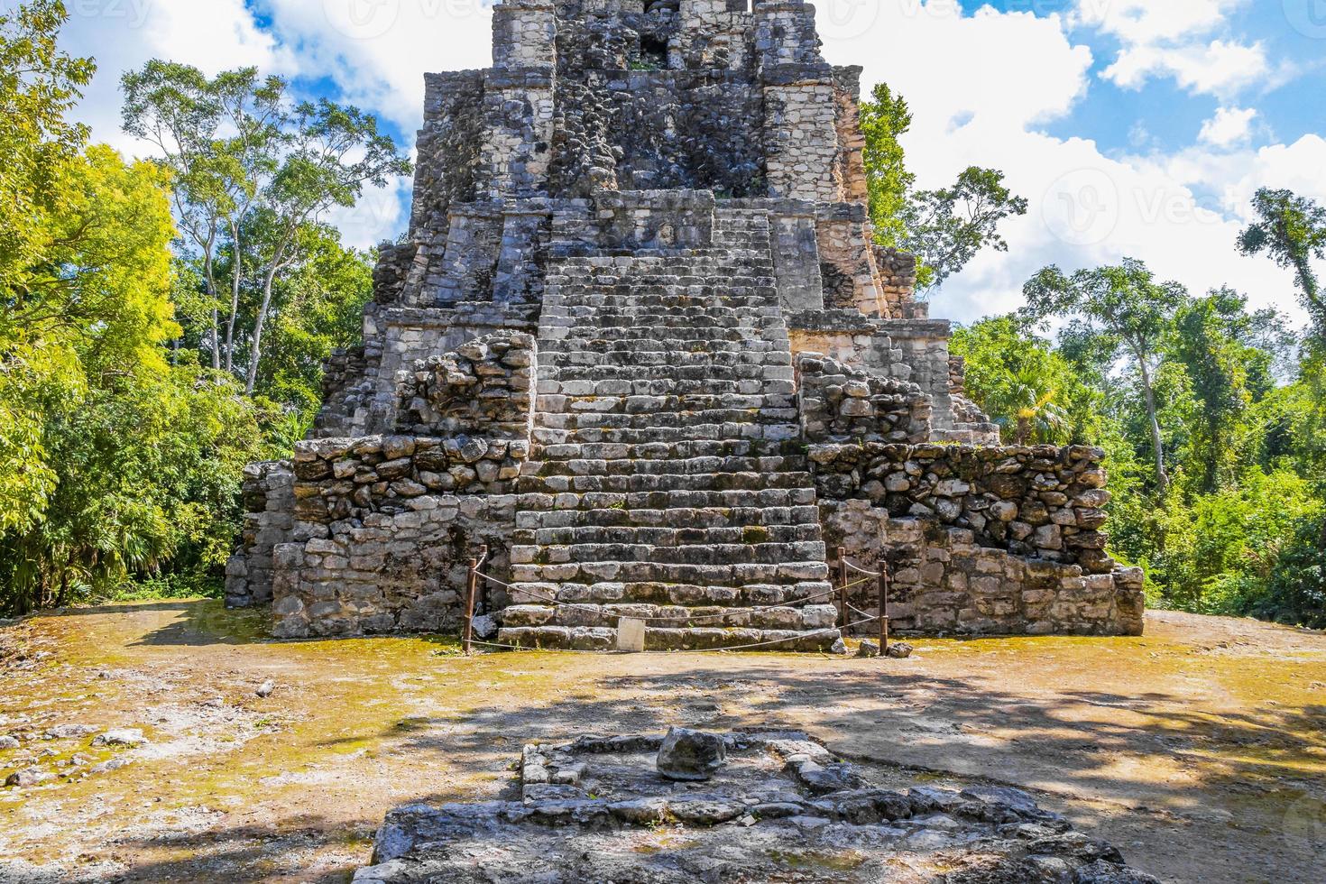 Ancient Mayan site with temple ruins pyramids artifacts Muyil Mexico. photo