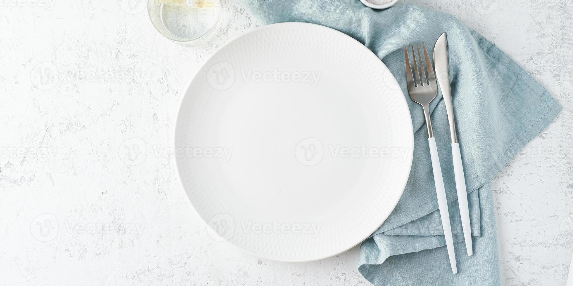 Clean empty white plate white stone table, copy space, mock up, top view, long banner photo