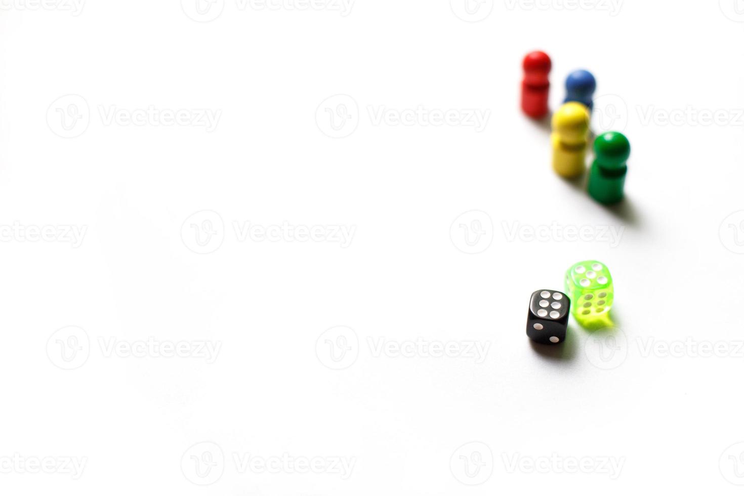 Game cubes, chips, hourglass on a white background. T photo