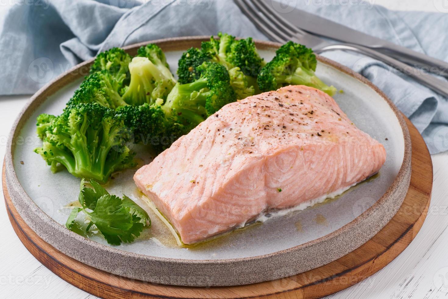 Steam salmon and vegetables, broccoli, paleo, keto, lshf or dash diet. Mediterranean food photo