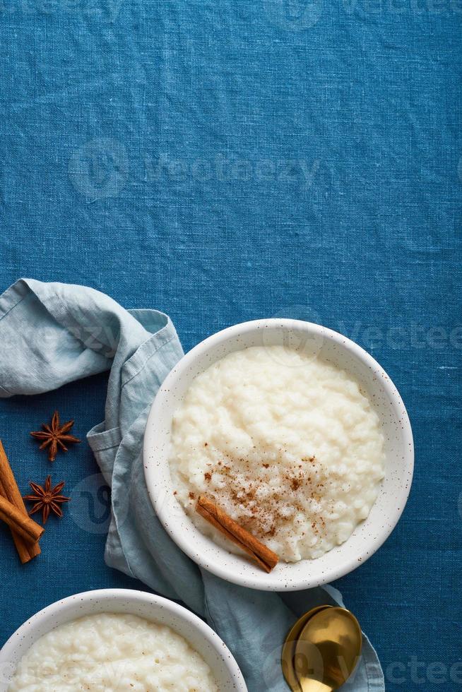 Rice pudding. French milk rice dessert. Top view, vertical, copy space
