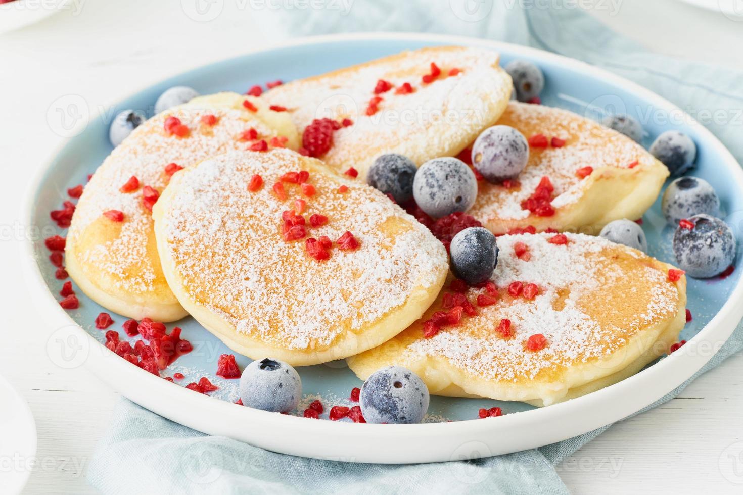 Fluffy japanese pancake, thick souffle. Trendy food. Delicious Breakfast photo