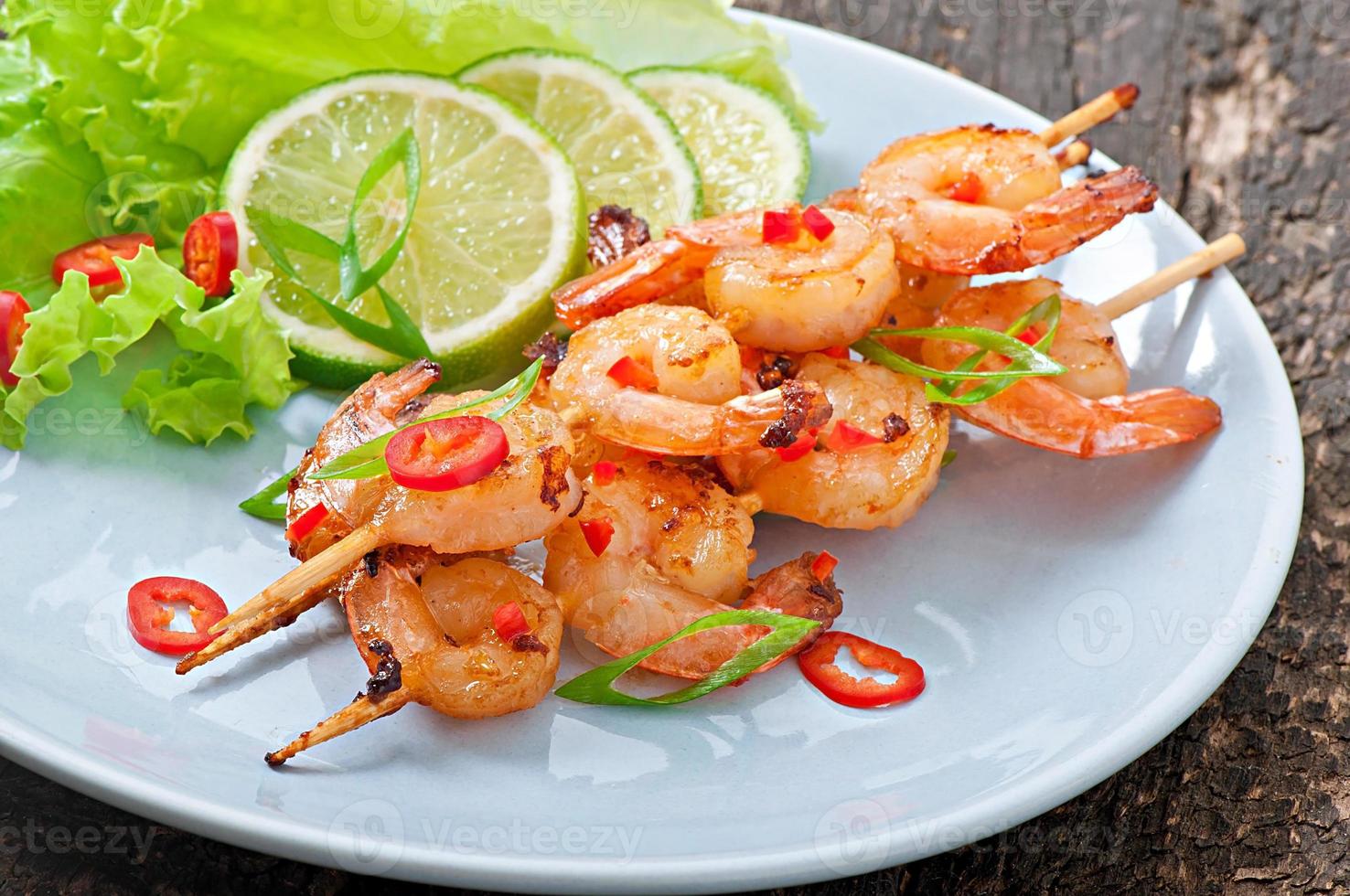 Shrimp sauteed in garlic and soy caramel photo