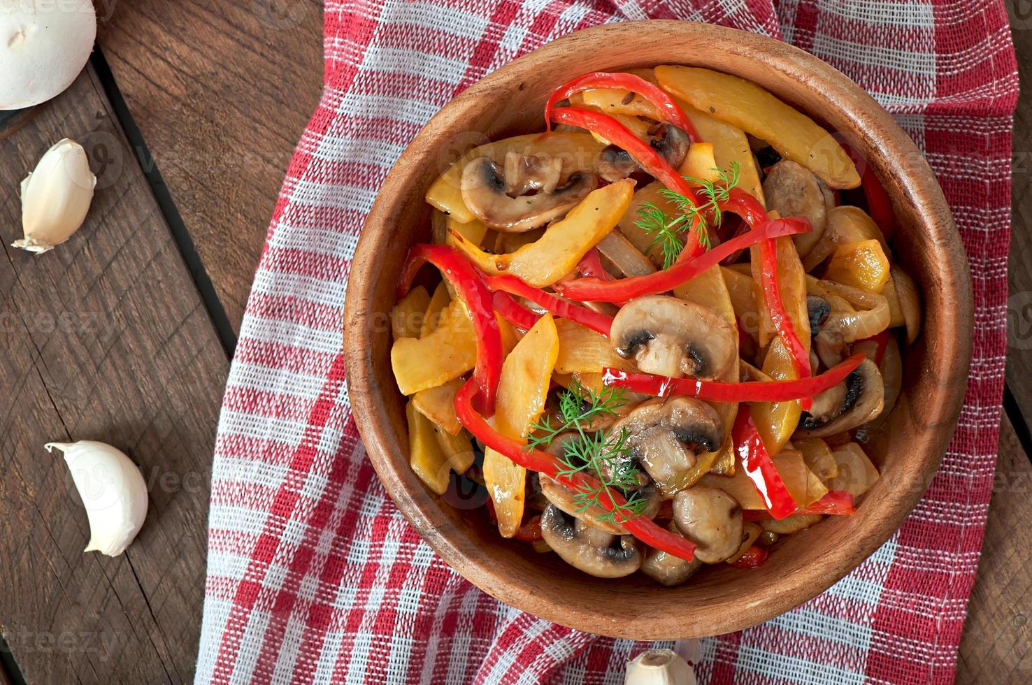 Sauteed mushrooms with pumpkin and sweet pepper photo